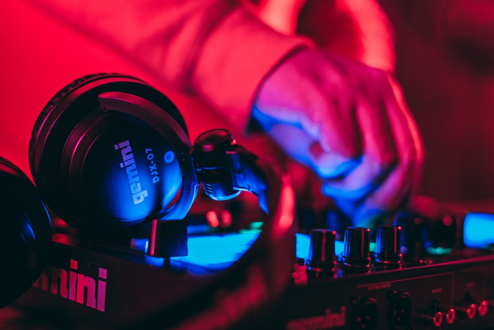 person operating a gemini DJ table